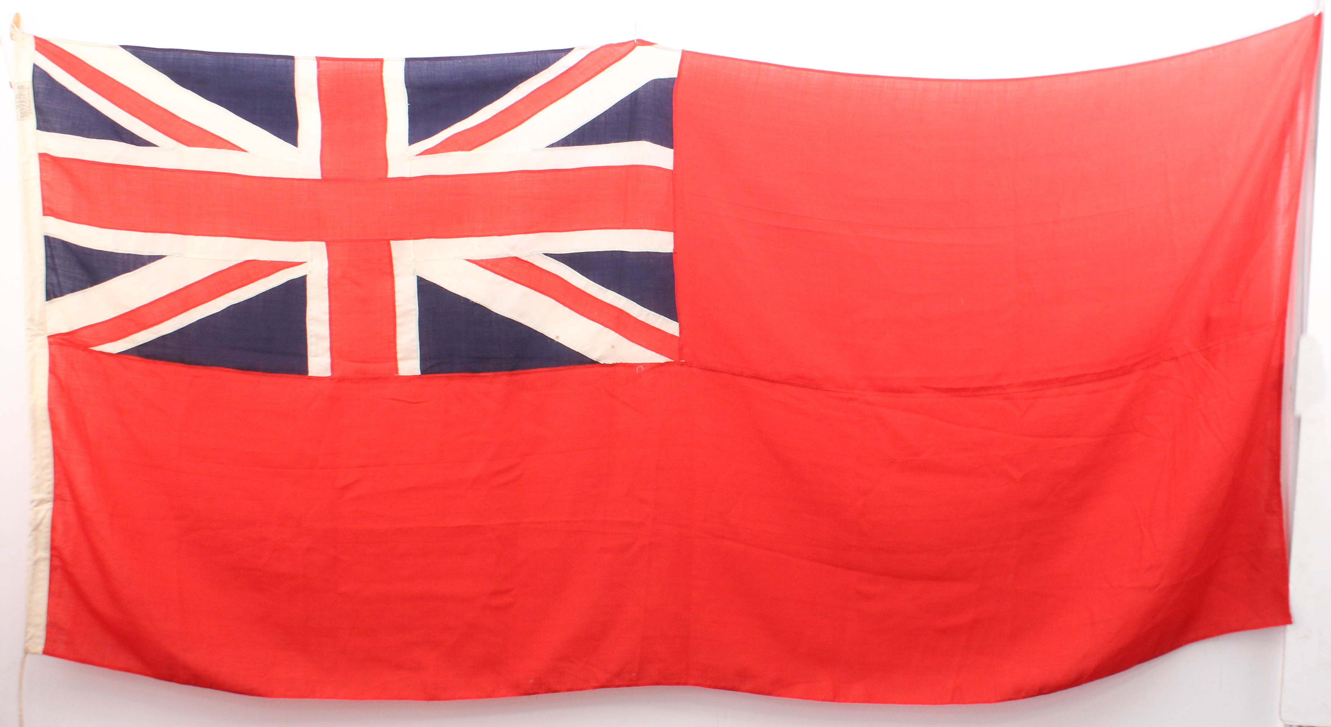 A vintage red ensign flag by John Edgington & Co., 108 Old Kent Road, London - 1930s-50s, 108 x 52