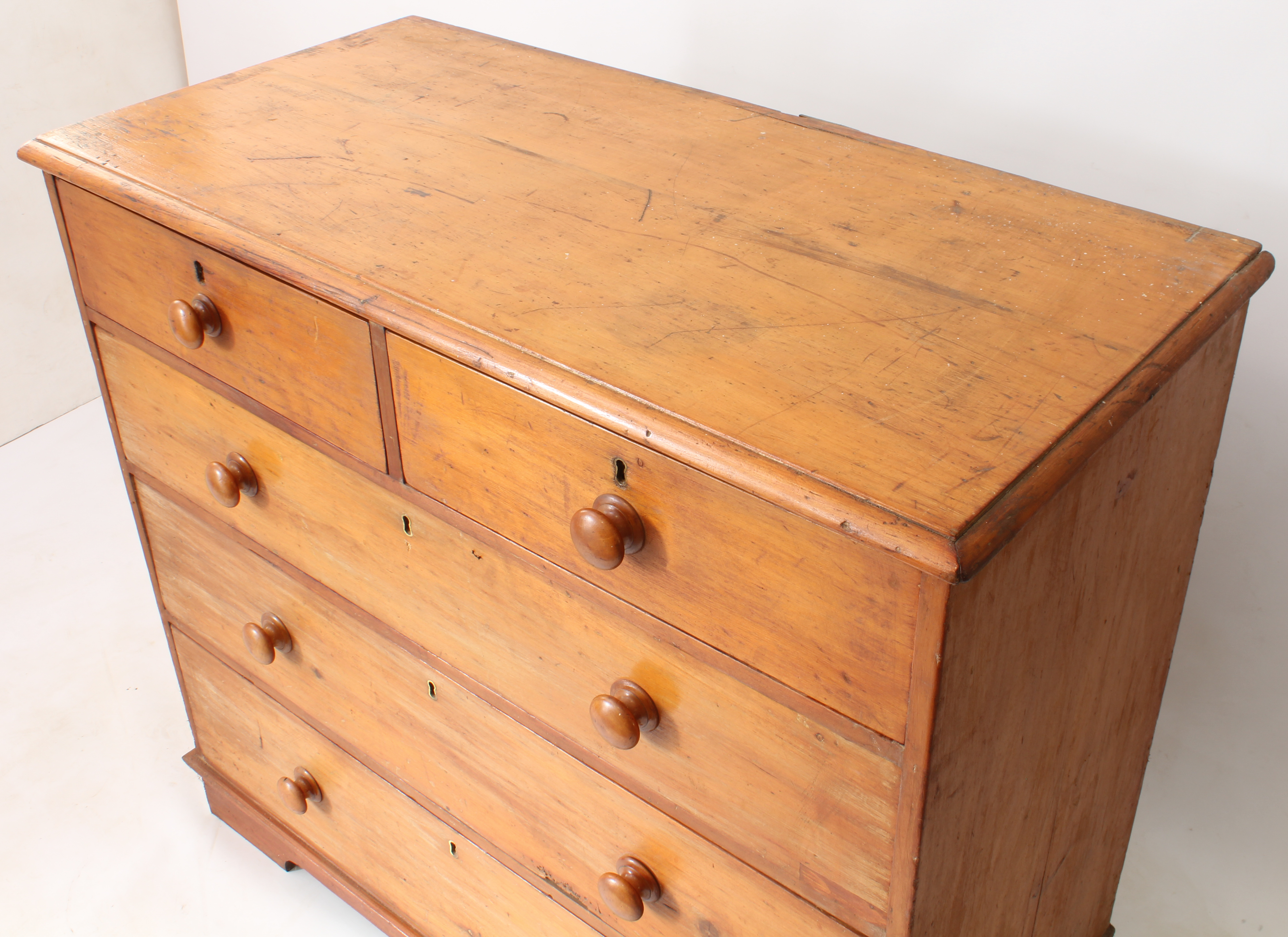 A Victorian pine chest of drawers - the moulded top over two short and three long graduated drawers, - Image 3 of 3