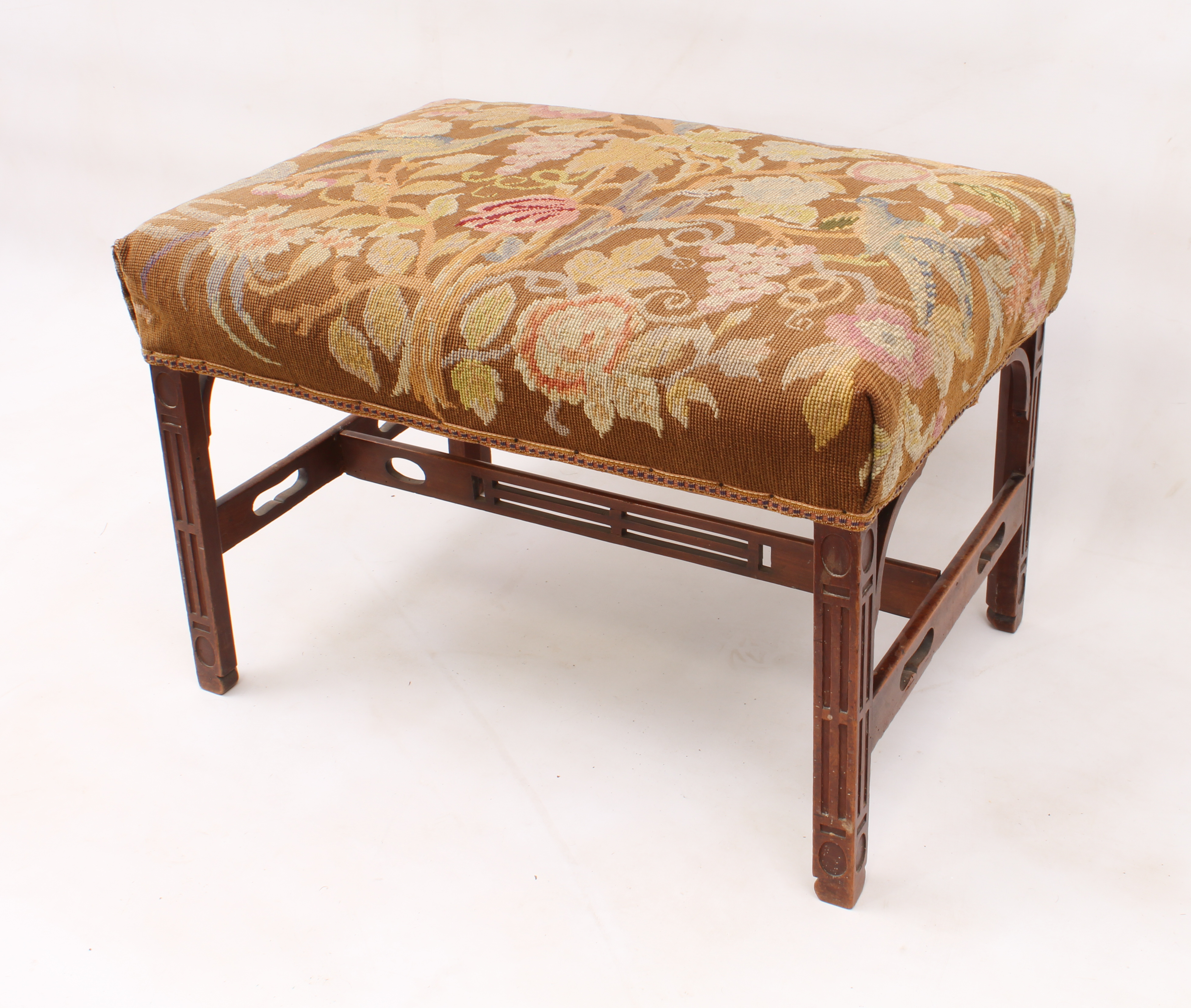 A George III style carved beech wood blind fret carved stool - 19th century, the rectangular stool