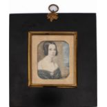 English School (mid-19th century) - a portrait miniature of a lady, watercolour on ivory, wearing