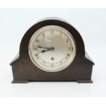 An oak-cased Garrard mantel clock - 1940s, 5½ in silvered dial with Arabic chapter ring, quarter