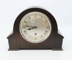 An oak-cased Garrard mantel clock - 1940s, 5½ in silvered dial with Arabic chapter ring, quarter