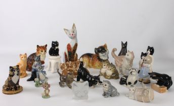 A collection of porcelain, china and other figures of cats and kittens - including examples by Wade,