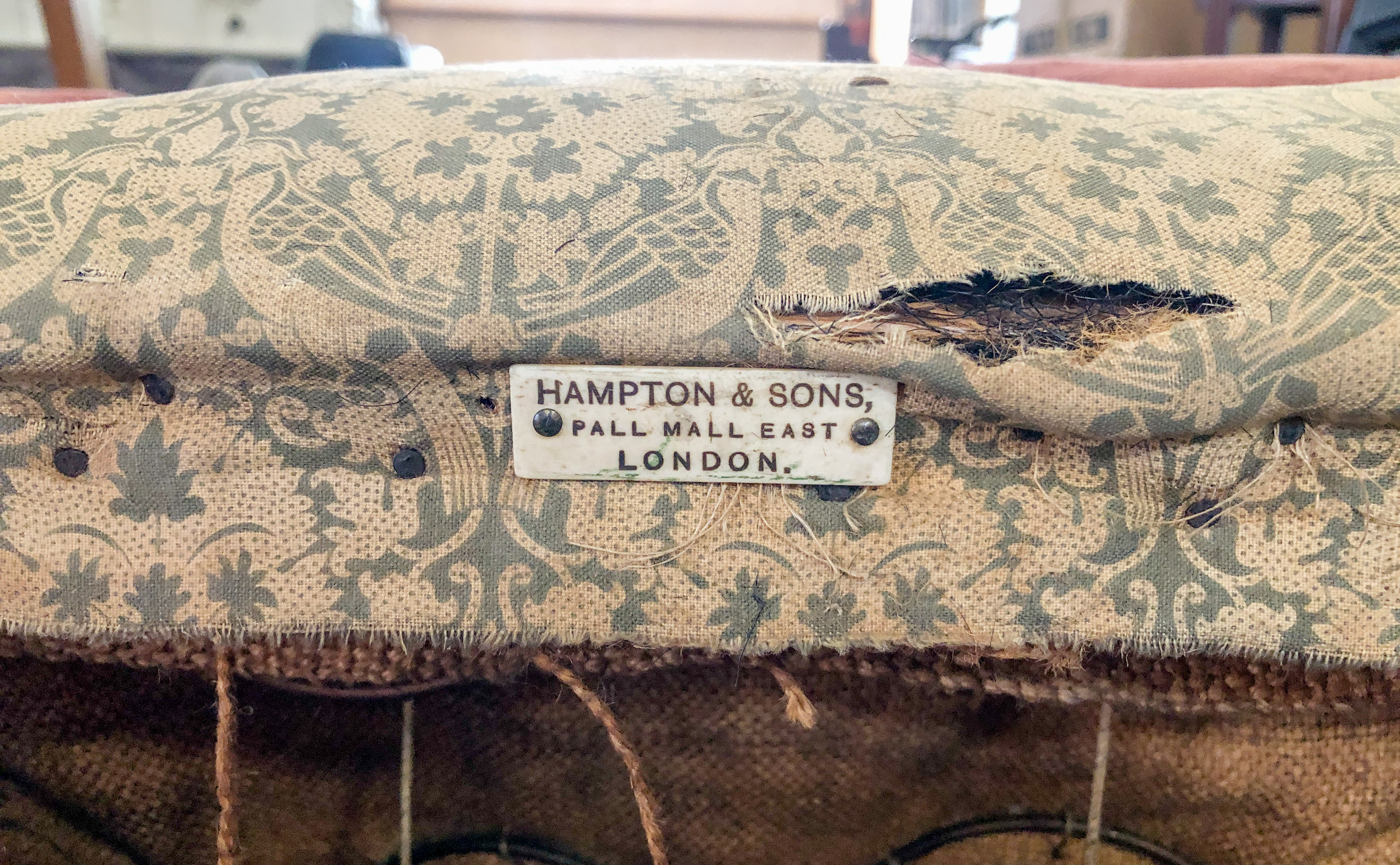 A late 19th / early 20th century Howard-style armchair by Hampton & Sons of London - in the original - Image 5 of 10