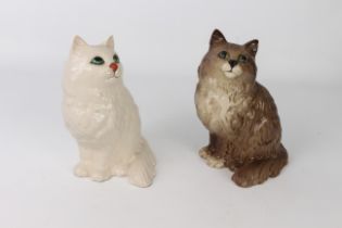 Two large Beswick 1867 seated Persian Cats - one white, the other grey-brown, impressed and