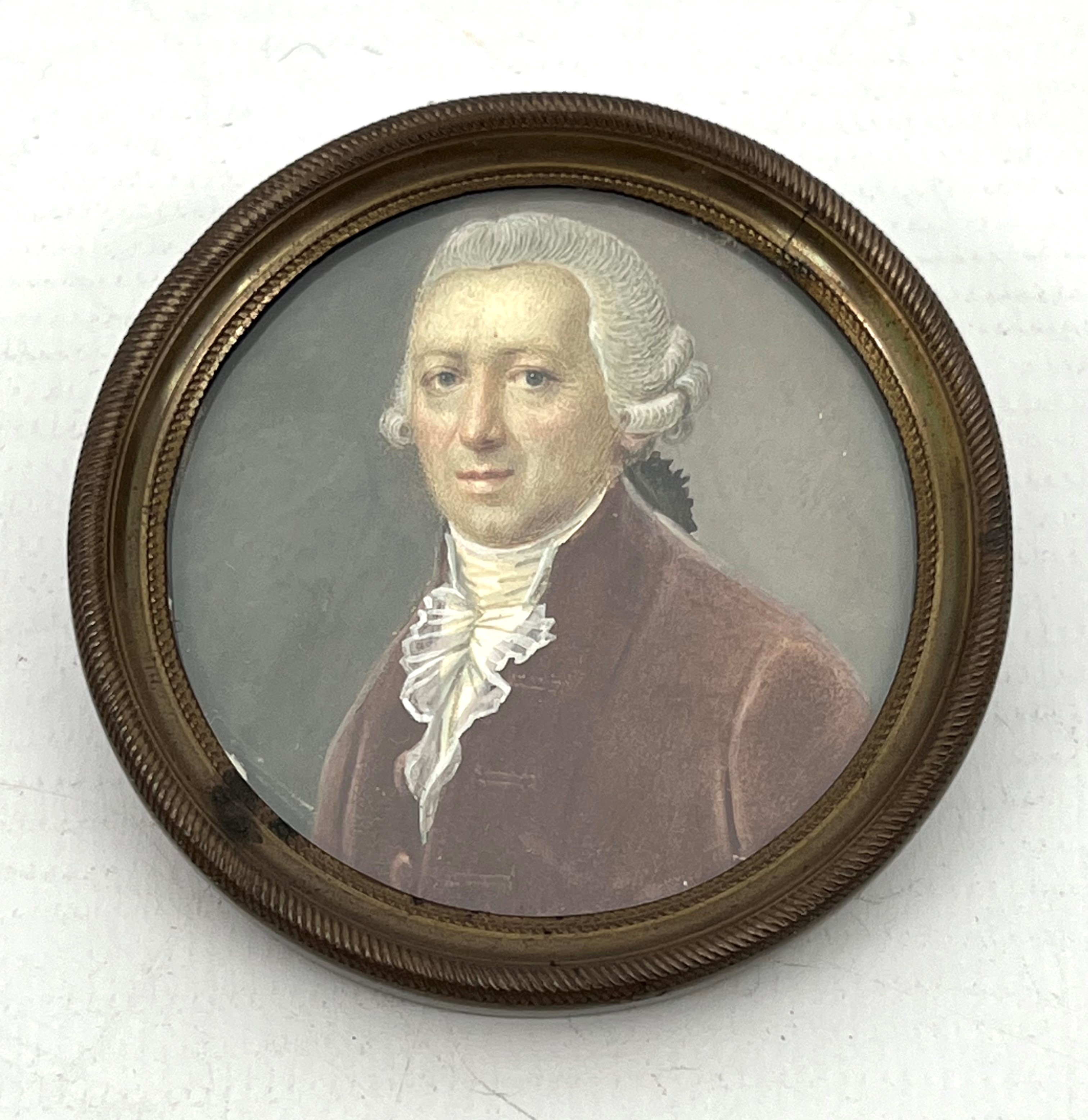 English School (late 18th century): a portrait miniature of a gentleman - oil on card, wearing a red