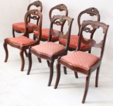 Six 19th century chairs: 1. a set of three Victorian carved rosewood balloon back chairs - with