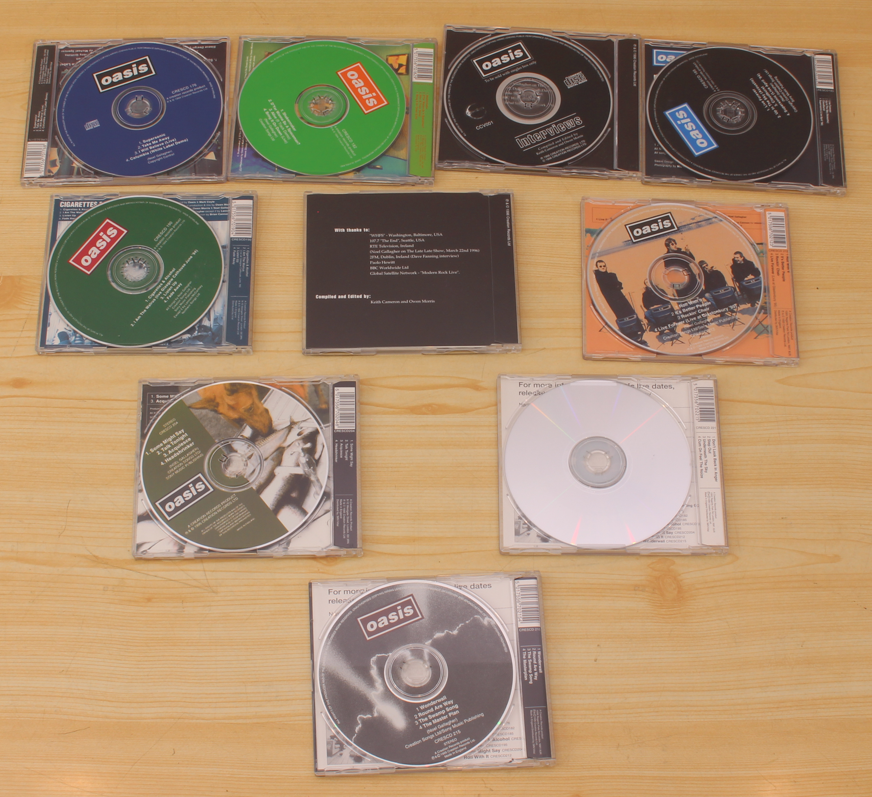 Two Oasis CD singles box sets to include: Definitely Maybe (5 CD singles box set with booklet - Image 4 of 4