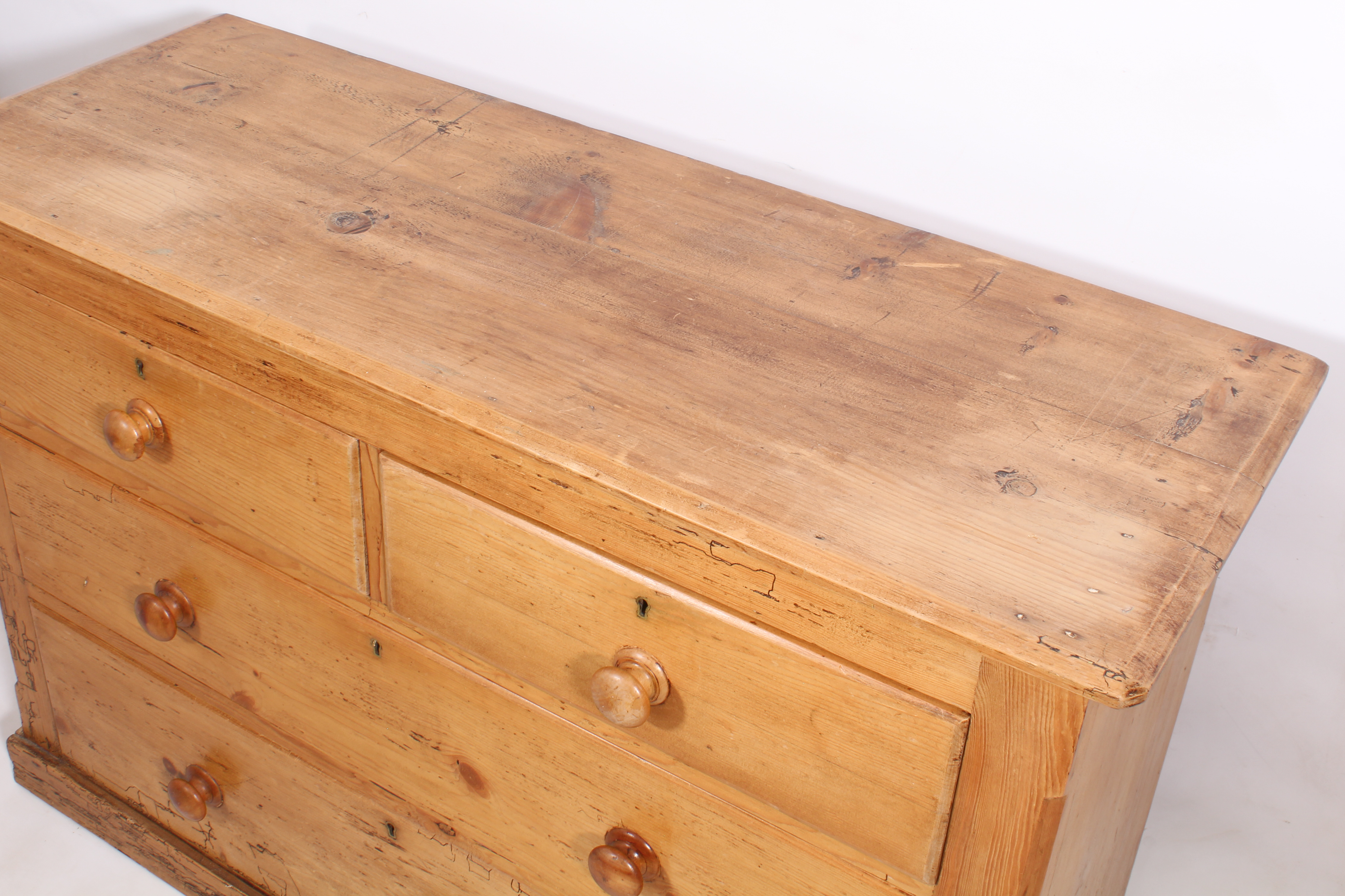A late-19th century waxed pine chest of drawers - the bevelled top over two short and two long - Image 3 of 3