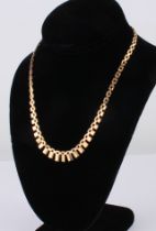 A vintage 9ct yellow gold fringe necklace - 1970s-80, Birmingham hallmarks, 43 cm  long.