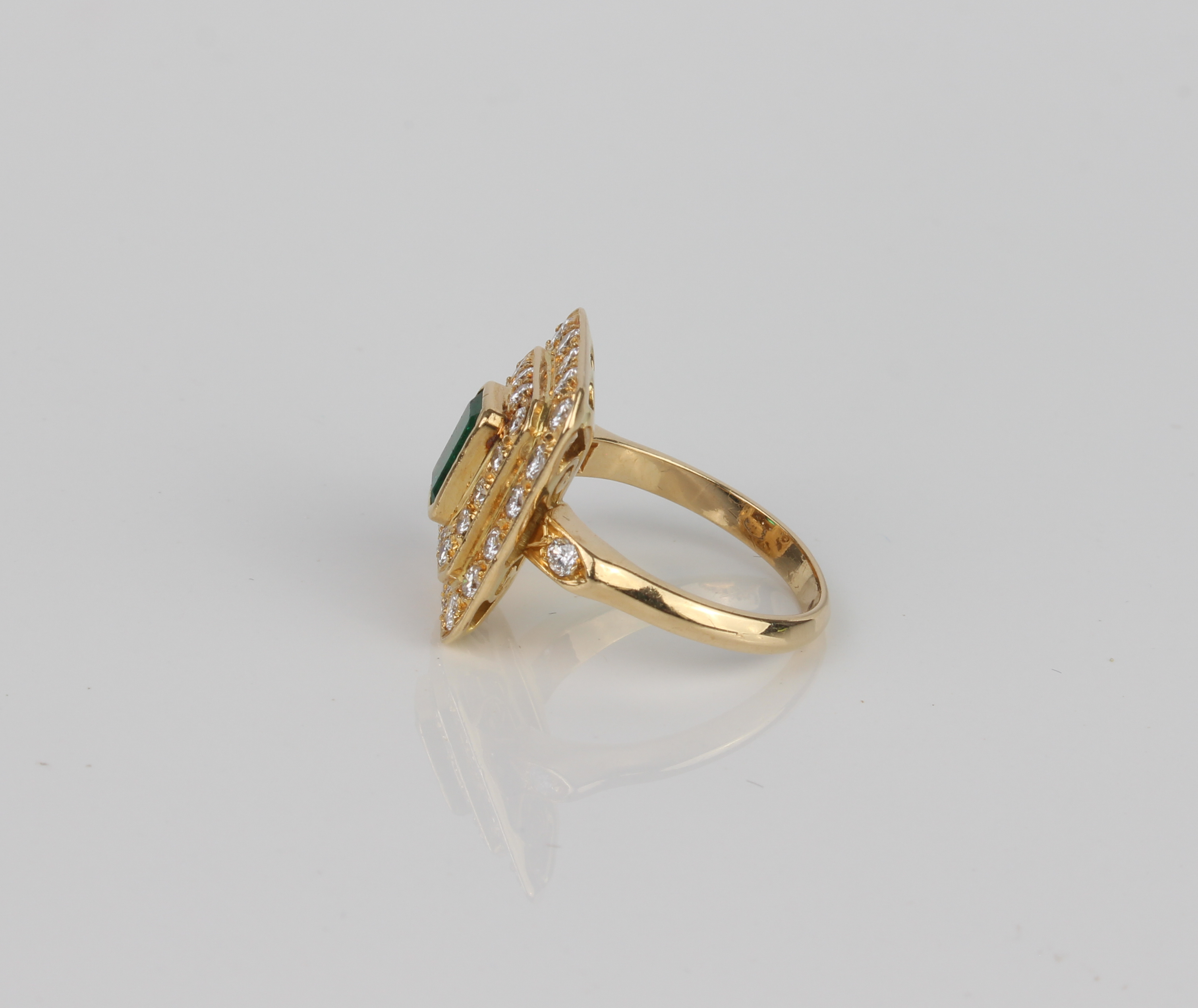 A French 18ct gold, emerald and diamond cluster ring - with French eagle's head mark, the 6.5 x 4. - Image 3 of 4