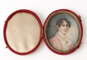 A 19th century portrait miniature of a lady on ivory, within red Moroccan leather case. Ivory