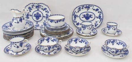 A collection of Minton blue and white dinner ware - early 20th century, comprising a two-handled