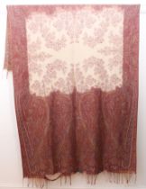 An antique Paisley shawl - probably early 20th century, with central ivory field decorated with