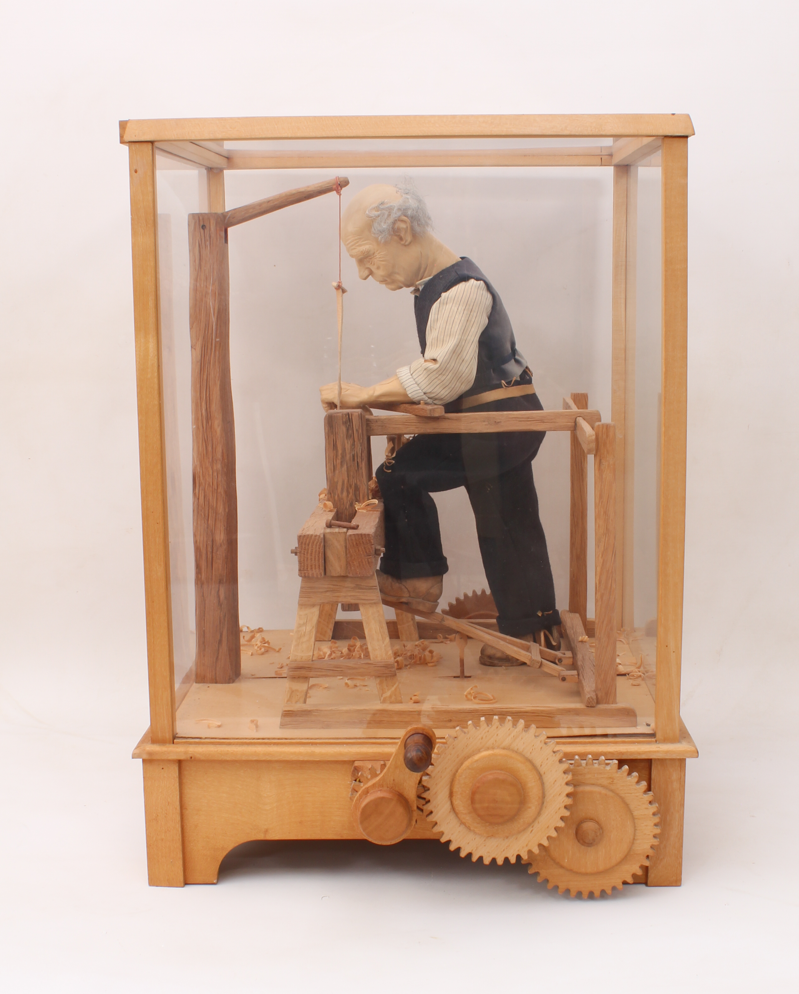 A fine carved wooden automaton of a woodworker, 'The Pole Lathe' - late 20th century, the carved - Image 3 of 6