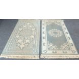 Two modern blue ground wool rugs (183 x 92 cm and 186 x 92 cm)