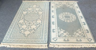 Two modern blue ground wool rugs (183 x 92 cm and 186 x 92 cm)