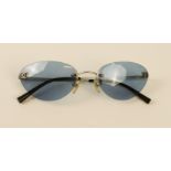 A pair of cased Chanel lady's sunglasses - ref. 4003 c103/72, with blue-tinted rimless lenses and