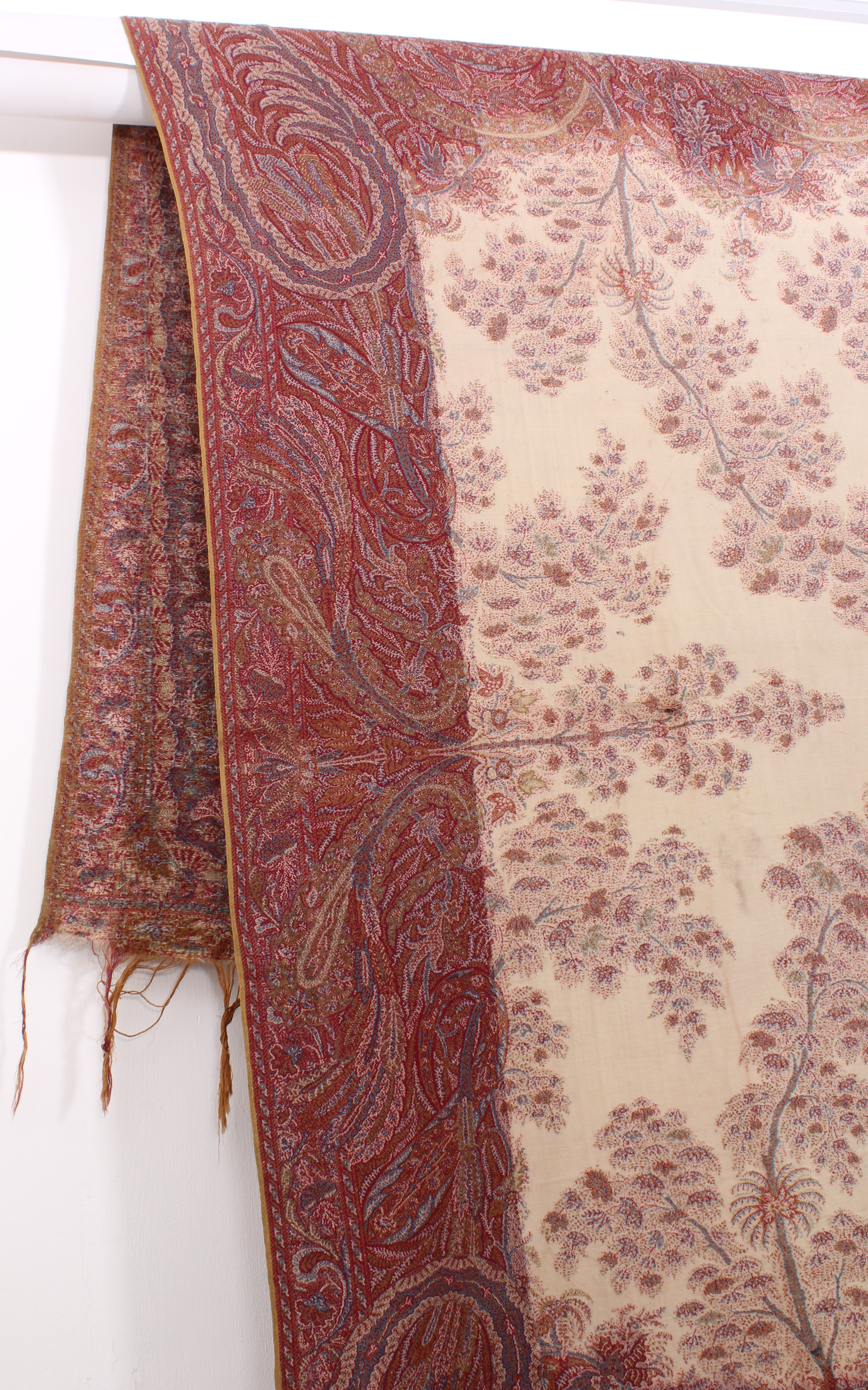 An antique Paisley shawl - probably early 20th century, with central ivory field decorated with - Image 3 of 4