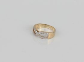 A 9ct gold and diamond 'double D' ring - London hallmarks, size Q, 4.4g.