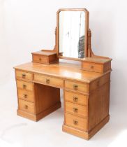 A late-19th century ash dressing-table - the back with rectangular mirror with clipped top