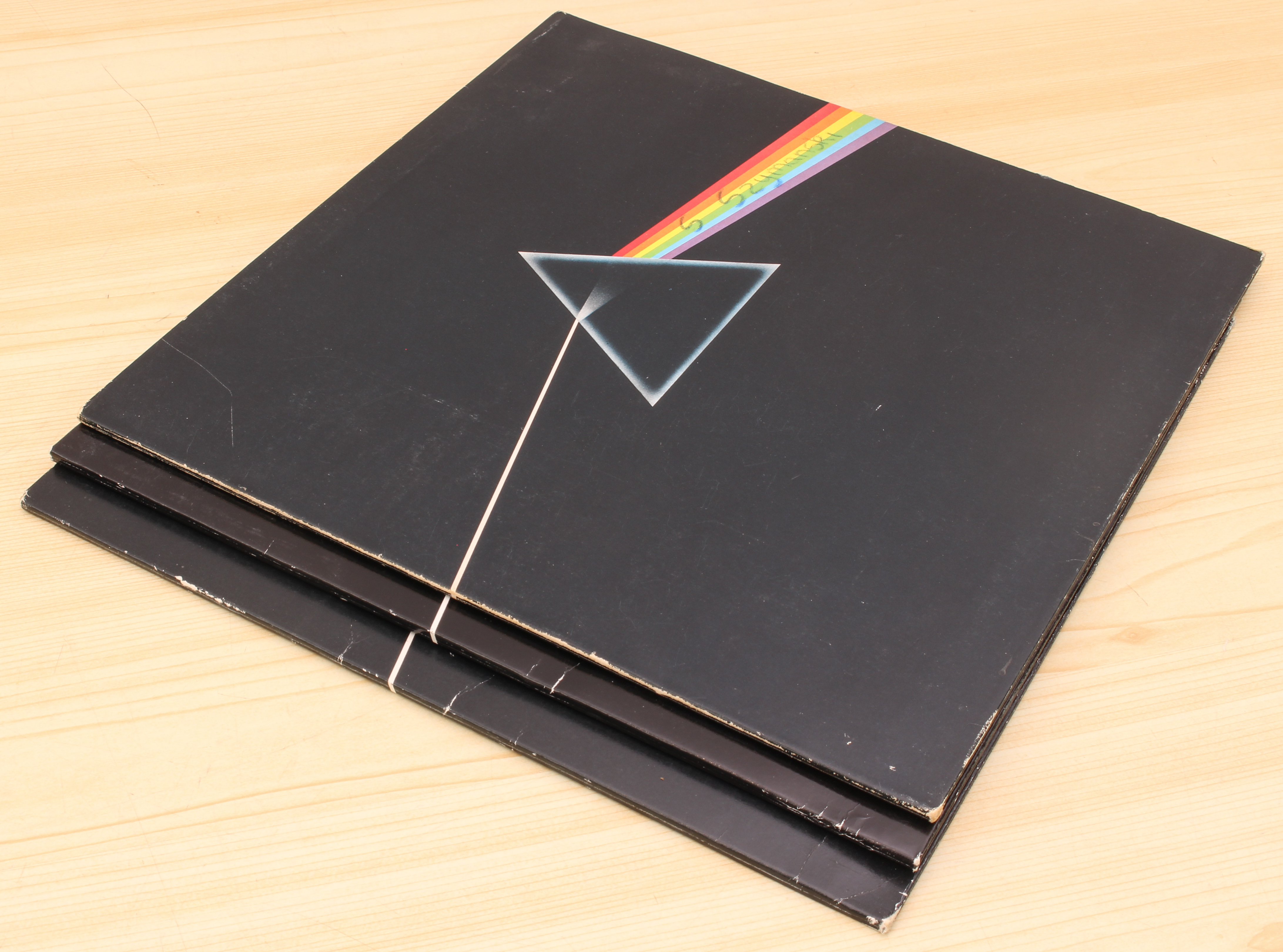 Three copies of Pink Floyd's Dark Side of the Moon to include: A3/B2 matrix; A3/B3 matrix and A11/