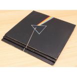 Three copies of Pink Floyd's Dark Side of the Moon to include: A3/B2 matrix; A3/B3 matrix and A11/