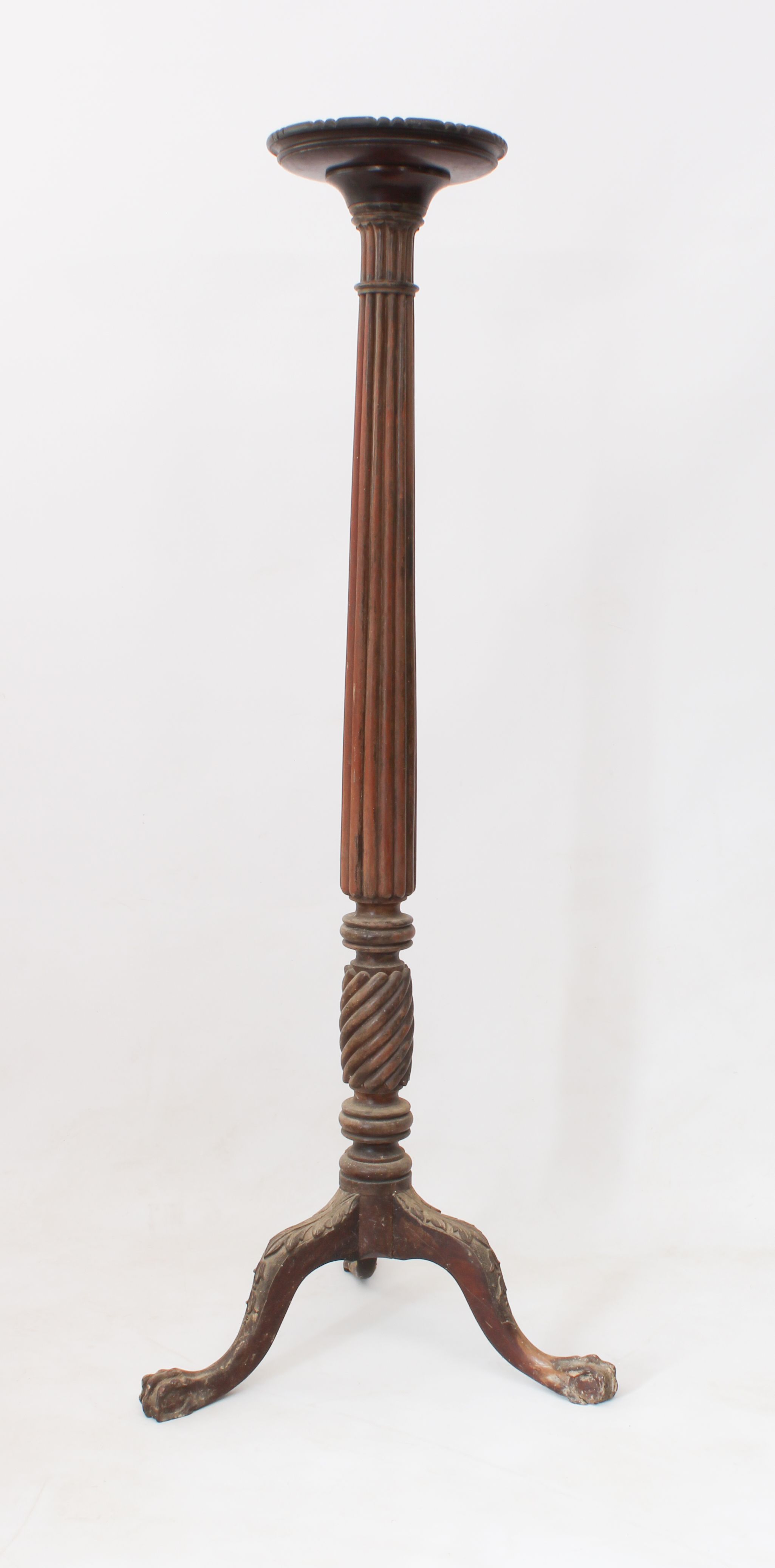 An early 20th century carved mahogany torchère - adapted from a 19th century bedpost, the dishes,