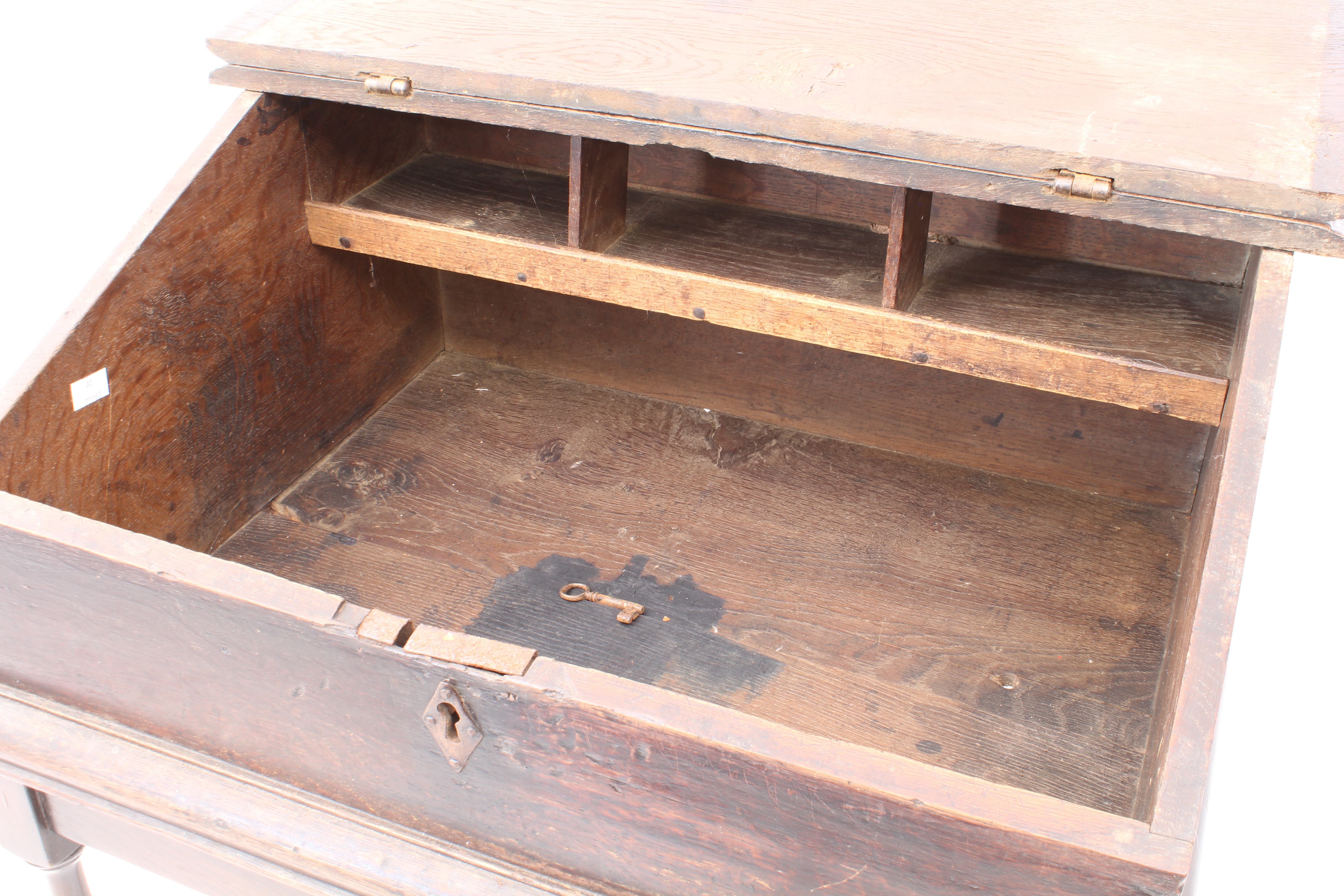 A late-18th century oak clerk's desk - the hinged lid with book-rest, enclosing a simply fitted - Image 4 of 4