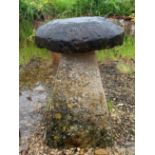 A Cotswold stone staddle stone - the top 47cm diameter, overall height 69cm.