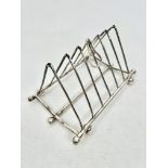 An unusual campaign-style six-division folding toast rack - early 20th century, possibly Elkington &