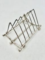 An unusual campaign-style six-division folding toast rack - early 20th century, possibly Elkington &