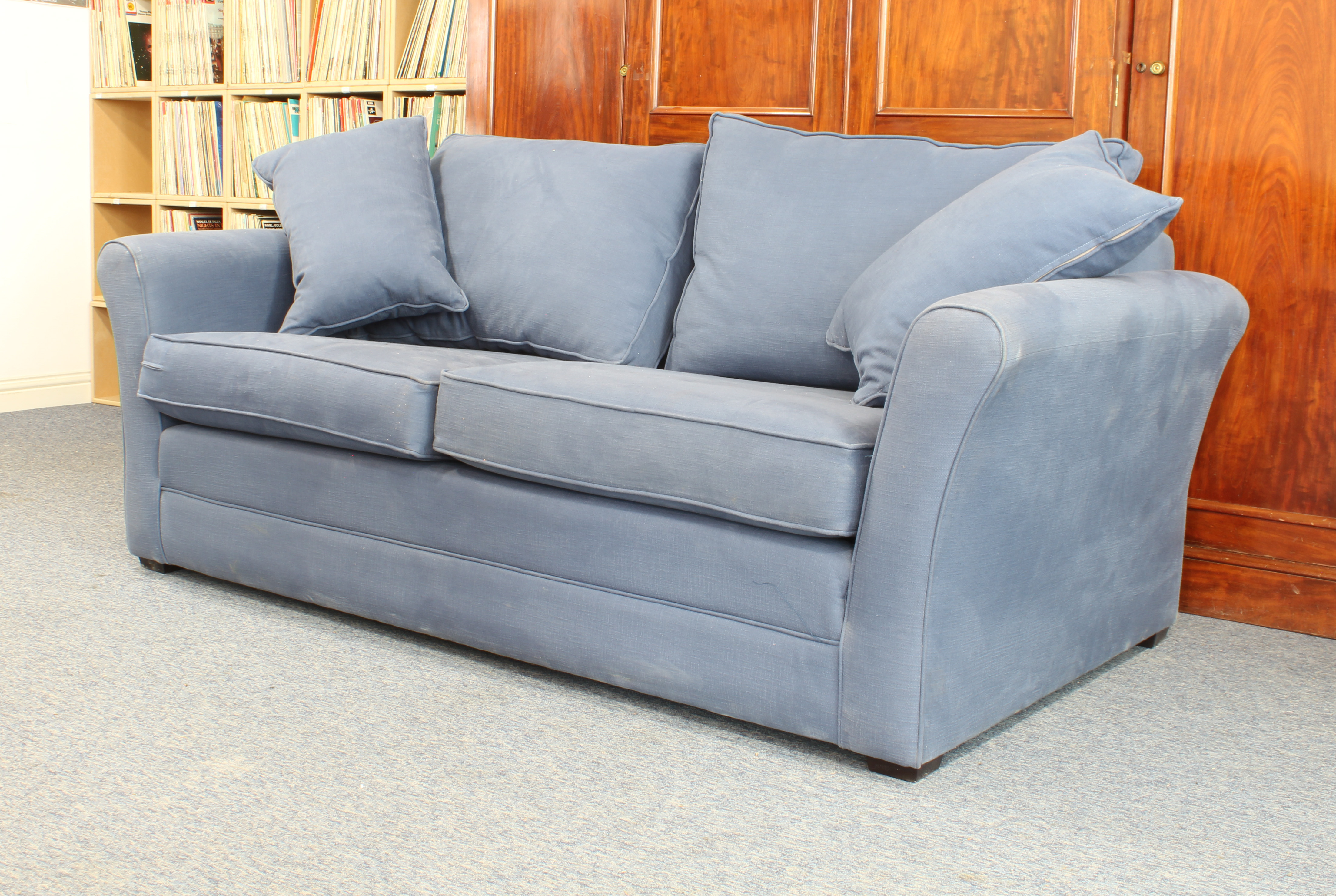 A Barker and Stonehouse 'Berkeley' three-seater sofa - circa 2022, in plain blue upholstery, on - Image 2 of 3