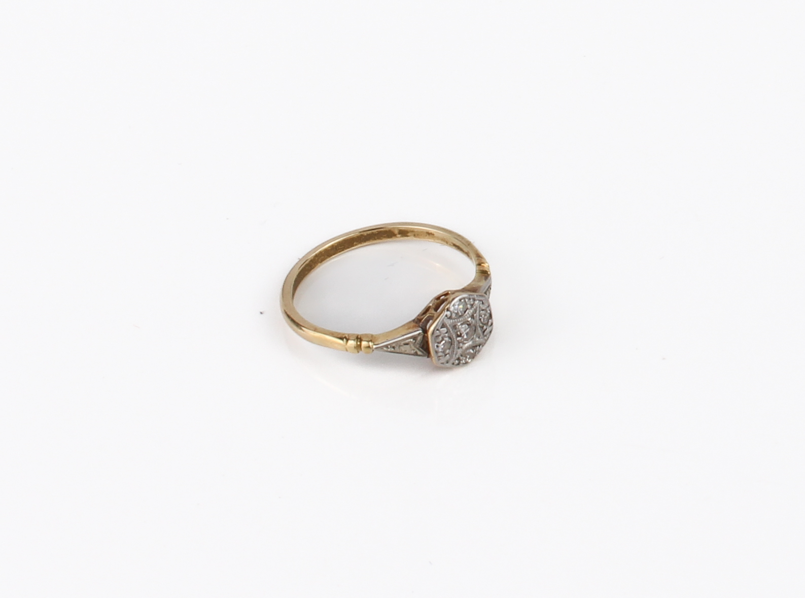 A mid-century 18ct yellow gold and diamond cluster ring - 1930s-40s, unmarked, tests as 18ct gold,