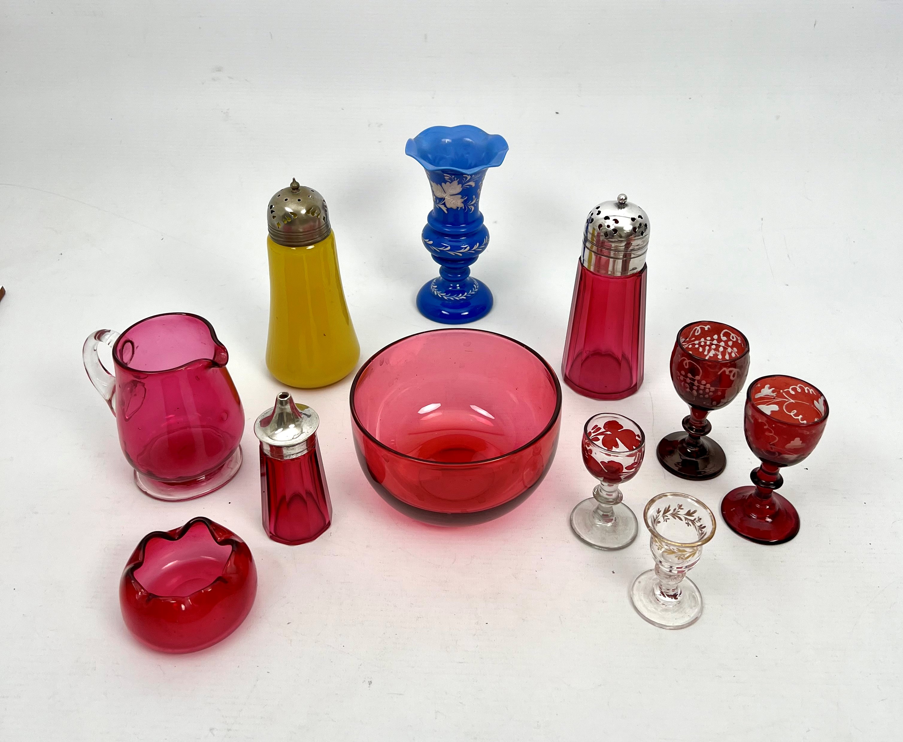 A small collection of Victorian and Edwardian coloured and cranberry glass - including an unusual