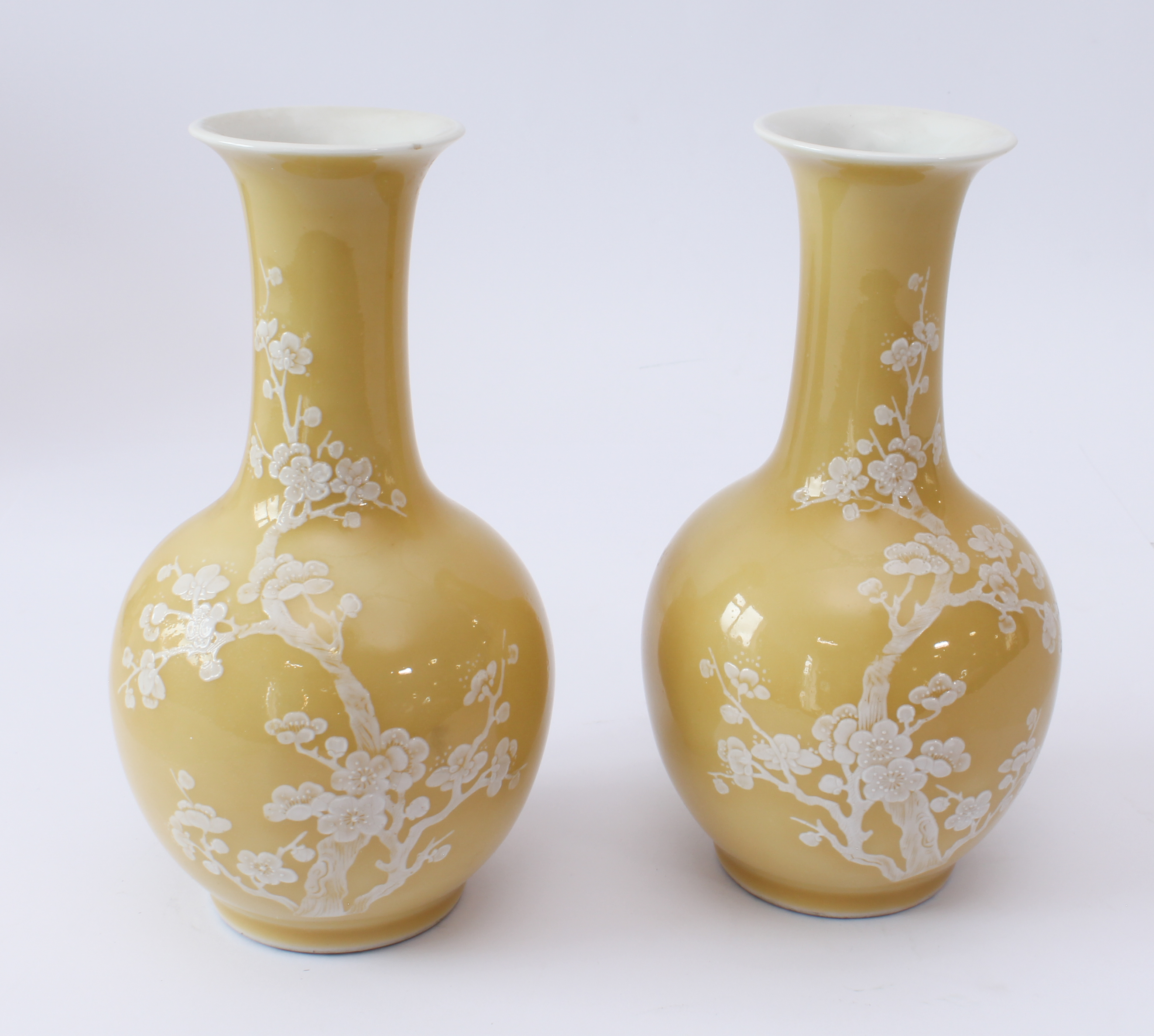 A pair of Chinese porcelain yellow-glazed bottle vases - late 20th century, with white enamelled - Image 2 of 7