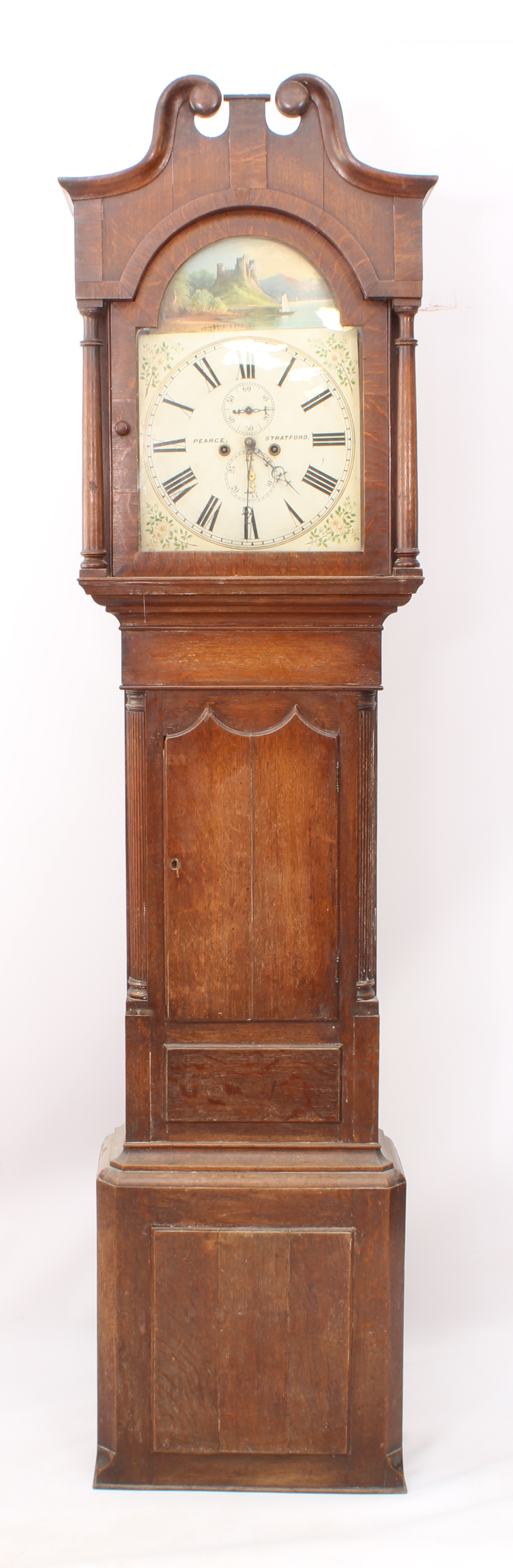 An early 19th century oak eight-day longcase clock by Pearce of Stratford - the signed, painted