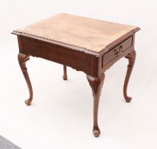 A Georgian-style centre table - late 20th century, the crossbanded top with outset corners, over a