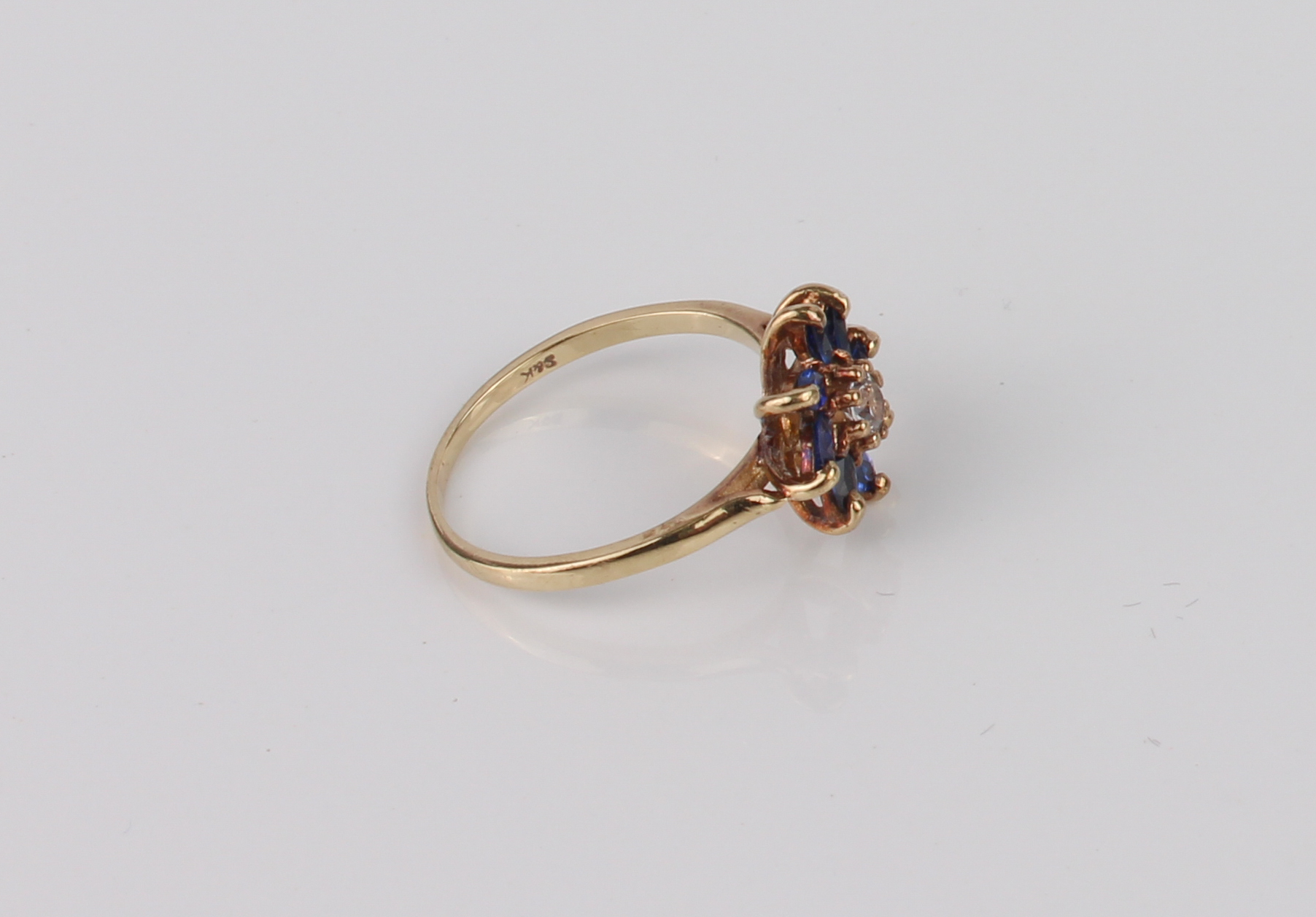 A vintage 9ct yellow gold, blue and white sapphire floral cluster ring - hallmarked London 1970, the - Image 2 of 4