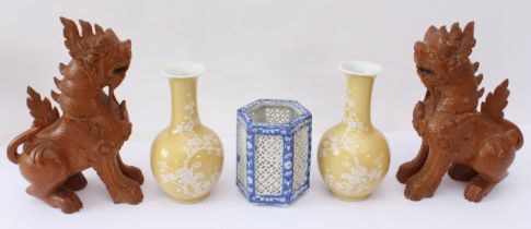 A pair of Chinese porcelain yellow-glazed bottle vases - late 20th century, with white enamelled