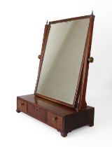 An early 19th century mahogany box base toilet mirror - with a rectangular plate and three drawer