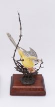 David Fryer Studios for Danbury Mint: a limited edition bronze and porcelain model of a Yellow