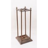A Victorian-style cast iron and brass stick-stand - 62 cm high.