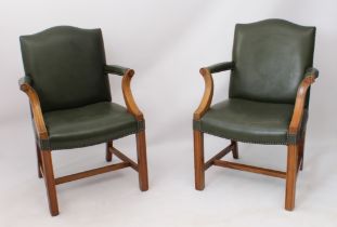 A pair of George III style mahogany and green leather library armchairs - second half 20th