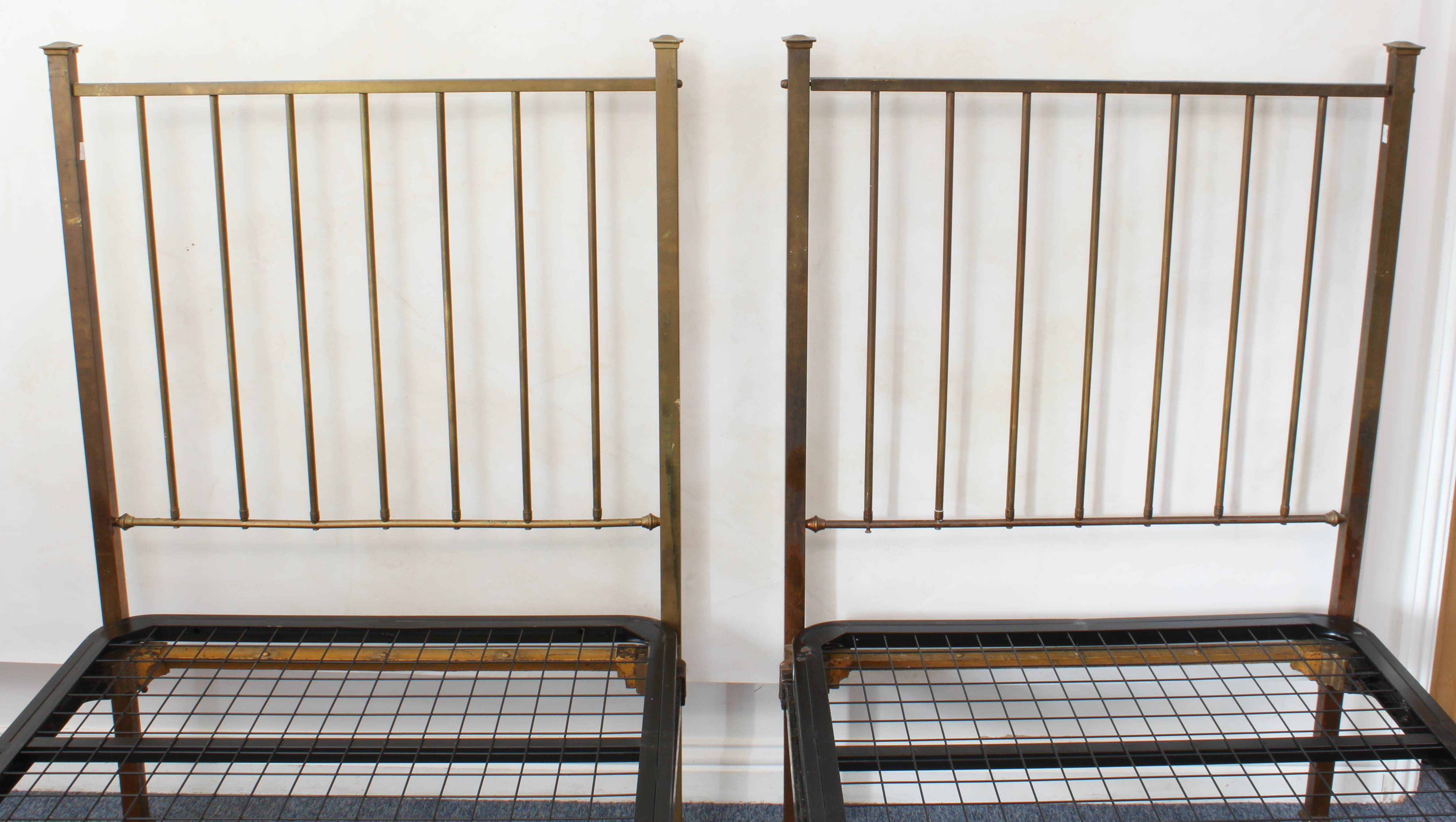 A pair of brass single beds by Heal & Sons (Heals) - 1920s-30s, the head and foot boards with square - Image 4 of 7