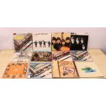 11 albums and one box set by The Beatles to include: Please Please Me; Help!; Beatles For Sale; With