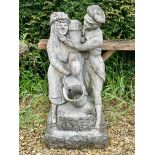 A composite stone water feature - depicting a couple standing beside a water tap, 76cm high.