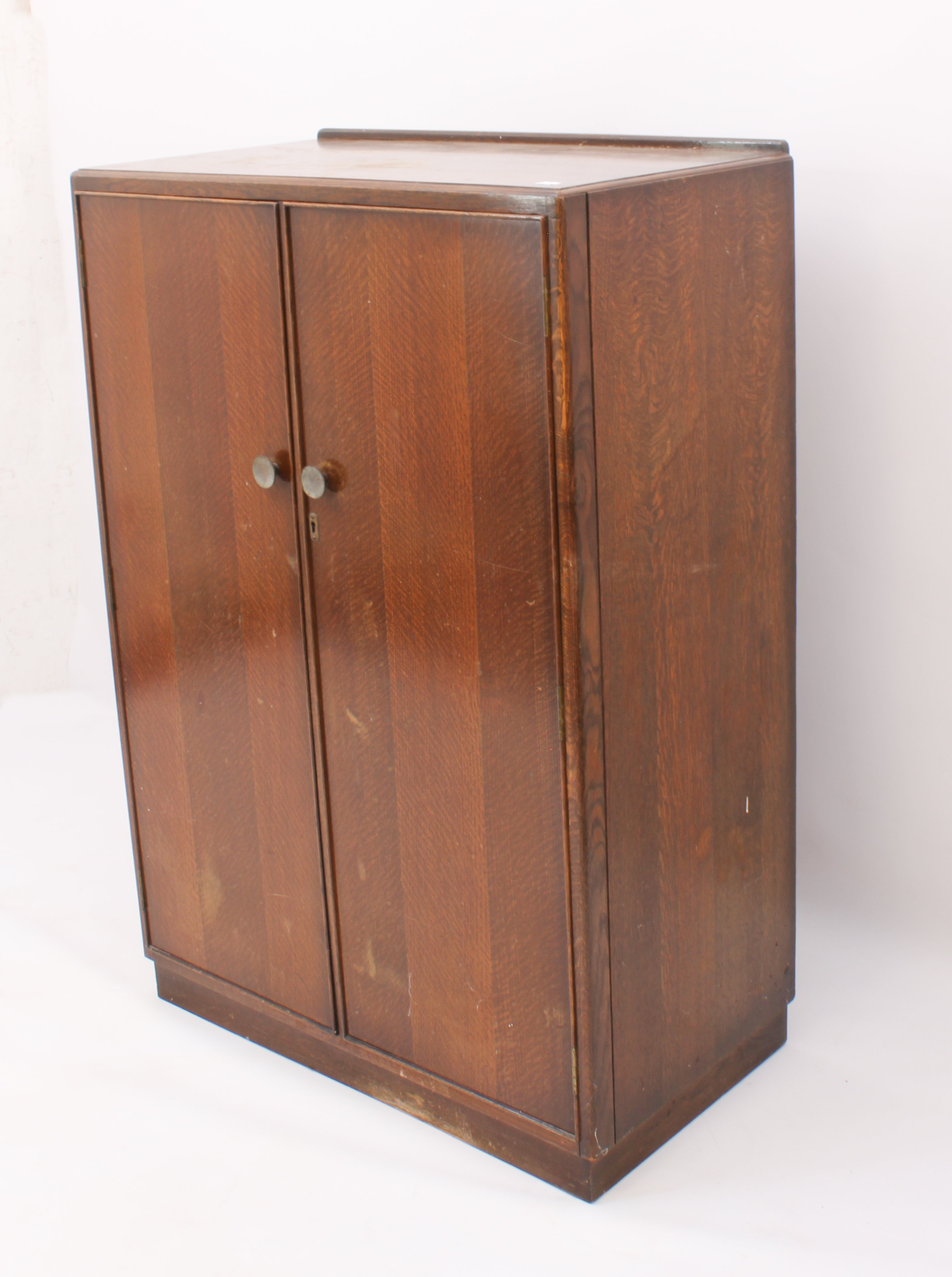 A 1940s-50s oak child's compactum wardrobe - striped veneered doors and inset plinth base, the - Image 3 of 3