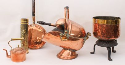 Six pieces of copper and brass ware: a late 19th century copper and brass helmet-shaped coal