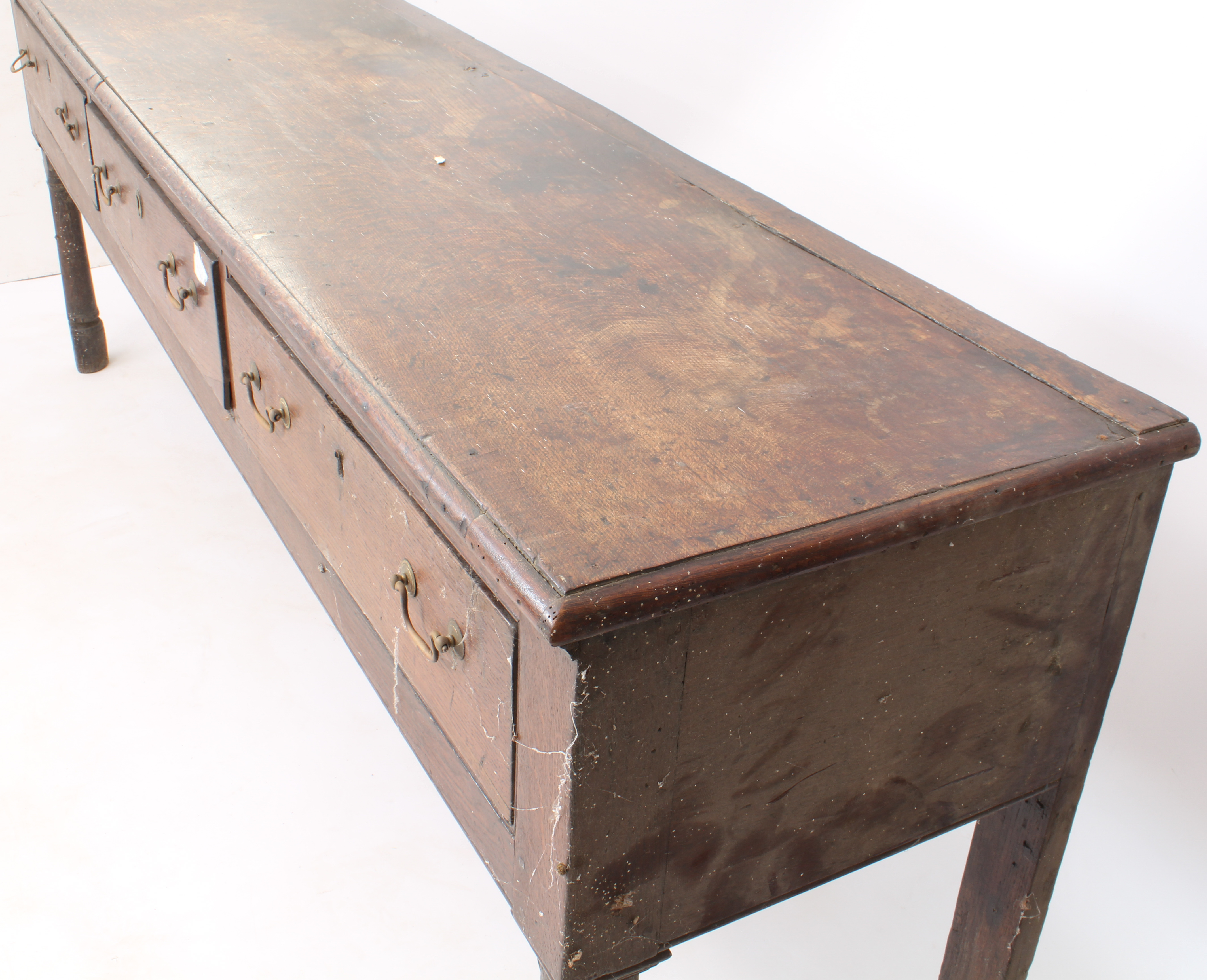 A late-18th century oak dresser base - the boarded top with applied half-round edge moulding, over - Image 3 of 4